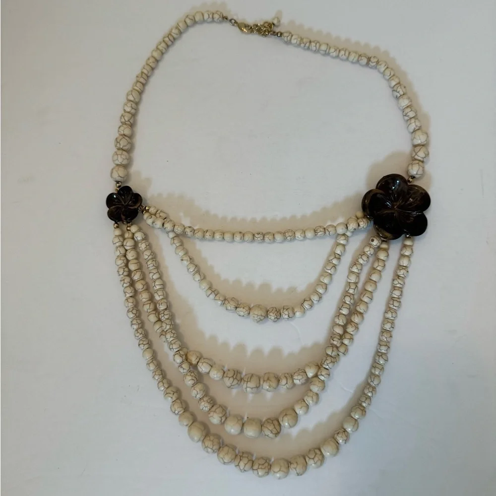 Gorgeous earth tone beaded necklace with brown floral accents